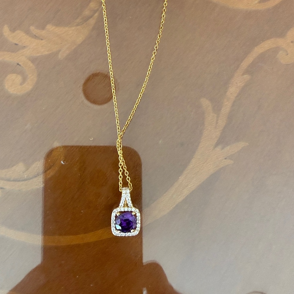 Elegant Gold Necklace with Purple Pendant